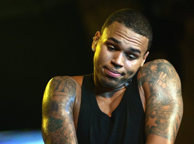 Chris Brown poses sexy on the cover of Urban Ink magazineShows off tattoos