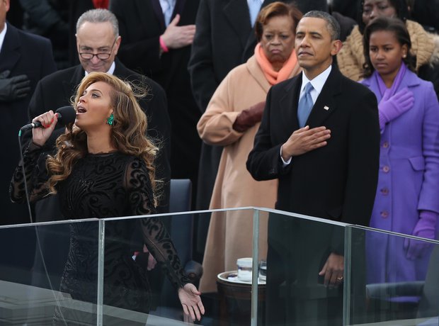 Beyonce performs the National Anthem during the pu