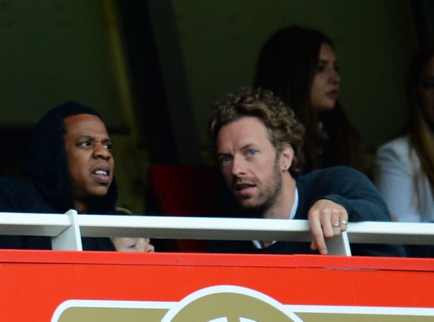 Jay-Z and Chris Marting watching football