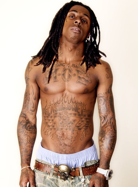 Lil Wayne shot himself, standing naked with tattoos