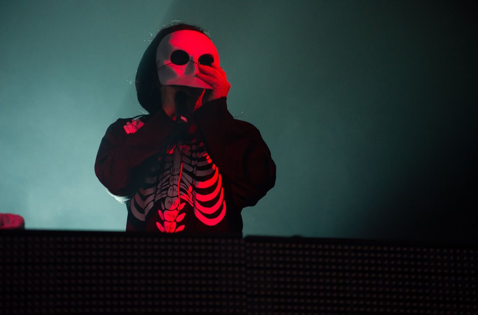 Skrillex djing with Halloween mask on