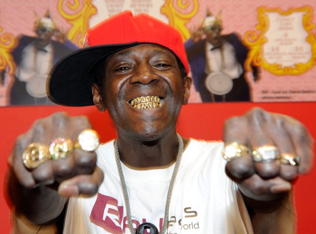 Flavor Flav with gold teeth grills
