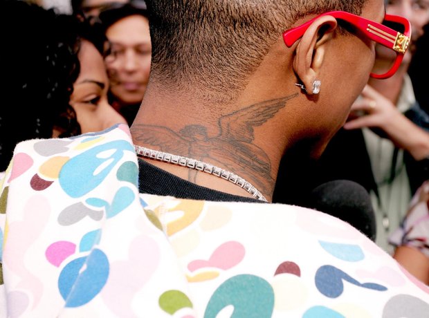 Neck Pharrell Williams Tattoos.