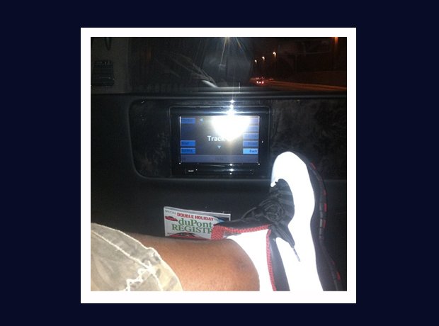 Rick Ross Instagram trainers in car