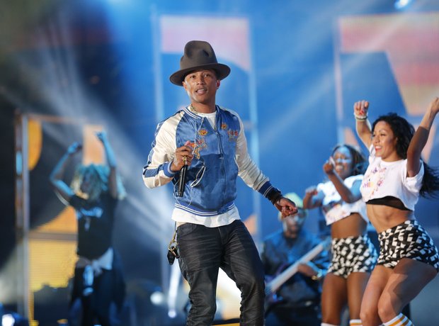 Pharell performing on stage