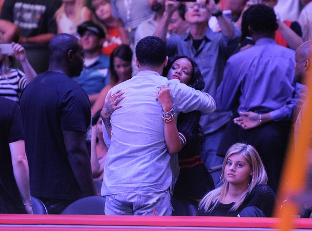 Rihanna and Drake hug at the basketball in Los Angeles
