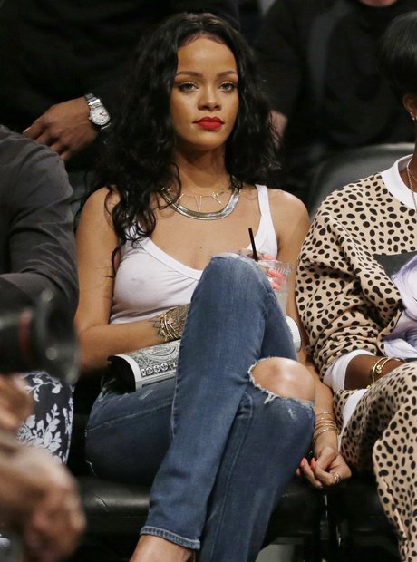 Rihanna watching basketball