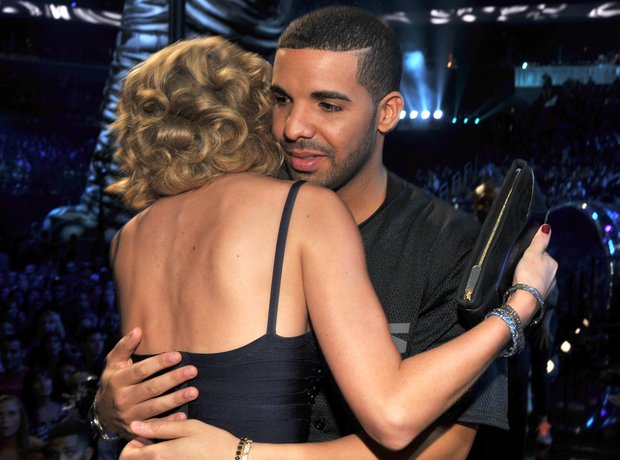 Drake hugging Taylor Swift