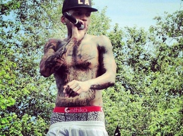 Kid Ink topless showing tattoos