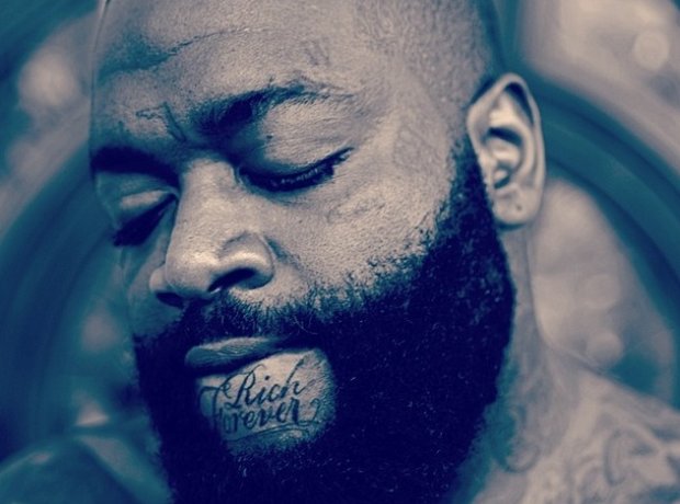 Rick Ross Rich Forever tattoo on chin