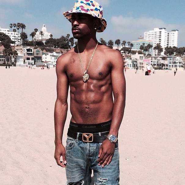 Big Sean topless on the beach