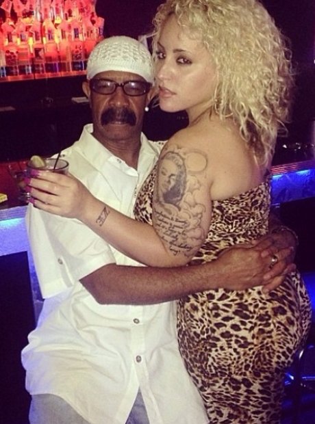 Drake's dad with woman