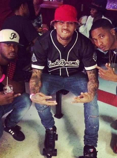 Chris Brown roller-skating with friends