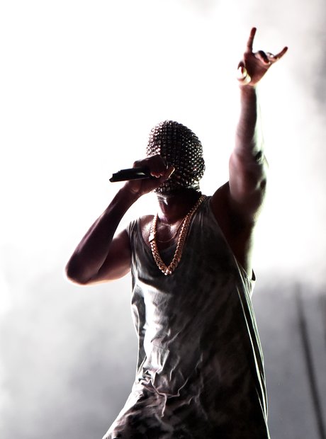 Kanye West wearing a diamond mask 