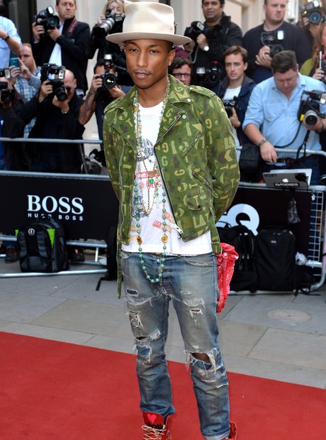 Pharrell Williams arrives at the GQ Awards 2014 