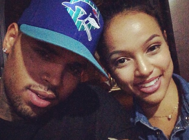 Chris Brown smiling with Karrueche
