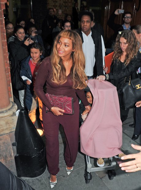 Beyonce with new fringe arriving in London