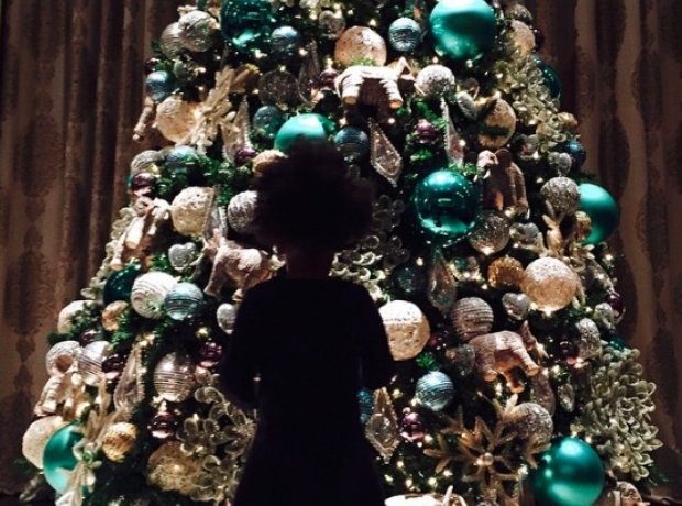 Blue Ivy by the Christmas Tree on Instagram