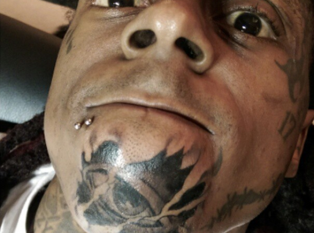 Lil' Wayne face tattoo