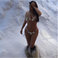 Image 10: Kim Kardashian wearing a fur bikini and sno boots 