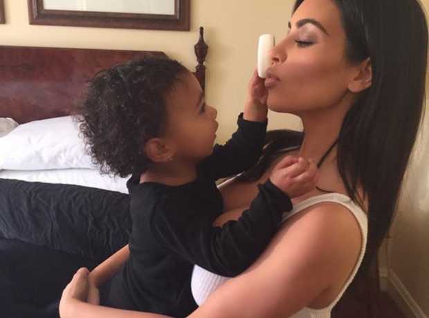 North West putting on mum's makeup