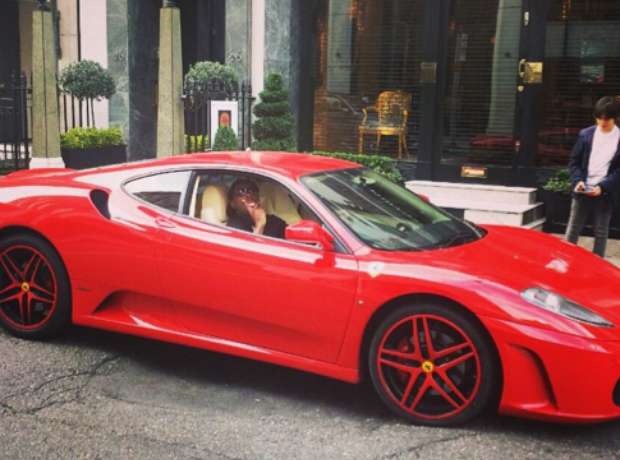 Dizzie Rascal in his Lamborghini