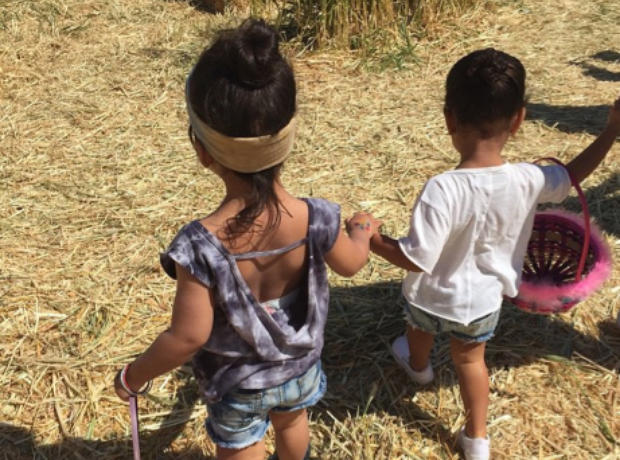 North West and friend, Ryan easter egg hunting