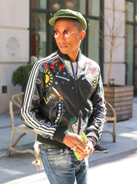 Pharrell wearing a colouful jacket