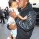 Image 9: Kanye West Kissing North 