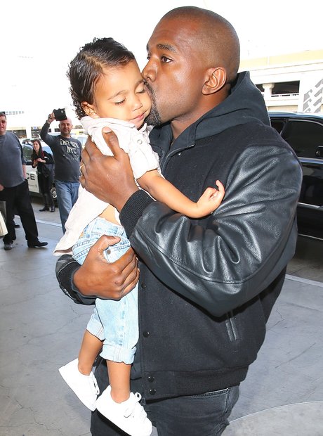 Kanye West Kissing North