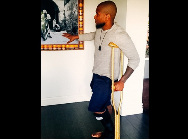 Usher gold crutches
