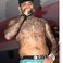 Image 2: Chris Brown performing topless