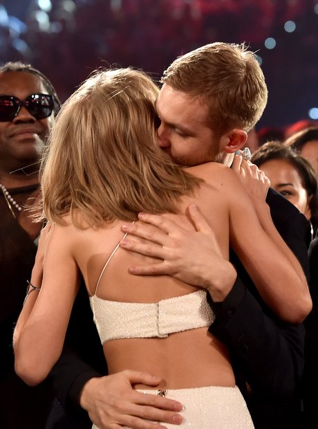 Taylor Swift and Calvin Harris Hug Billboard Music