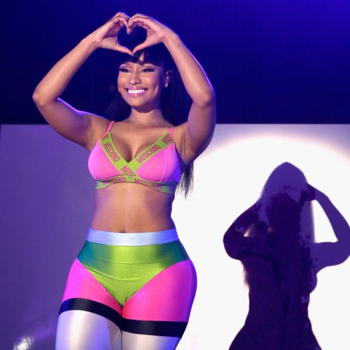 Nicki Minaj wearing a tight jumpsuit