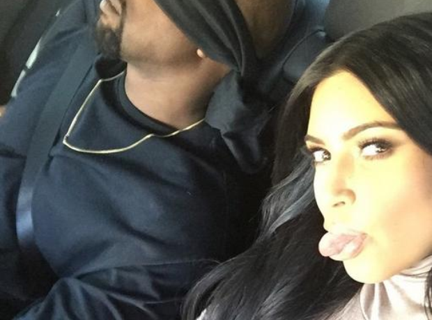 Kanye West blindfolded