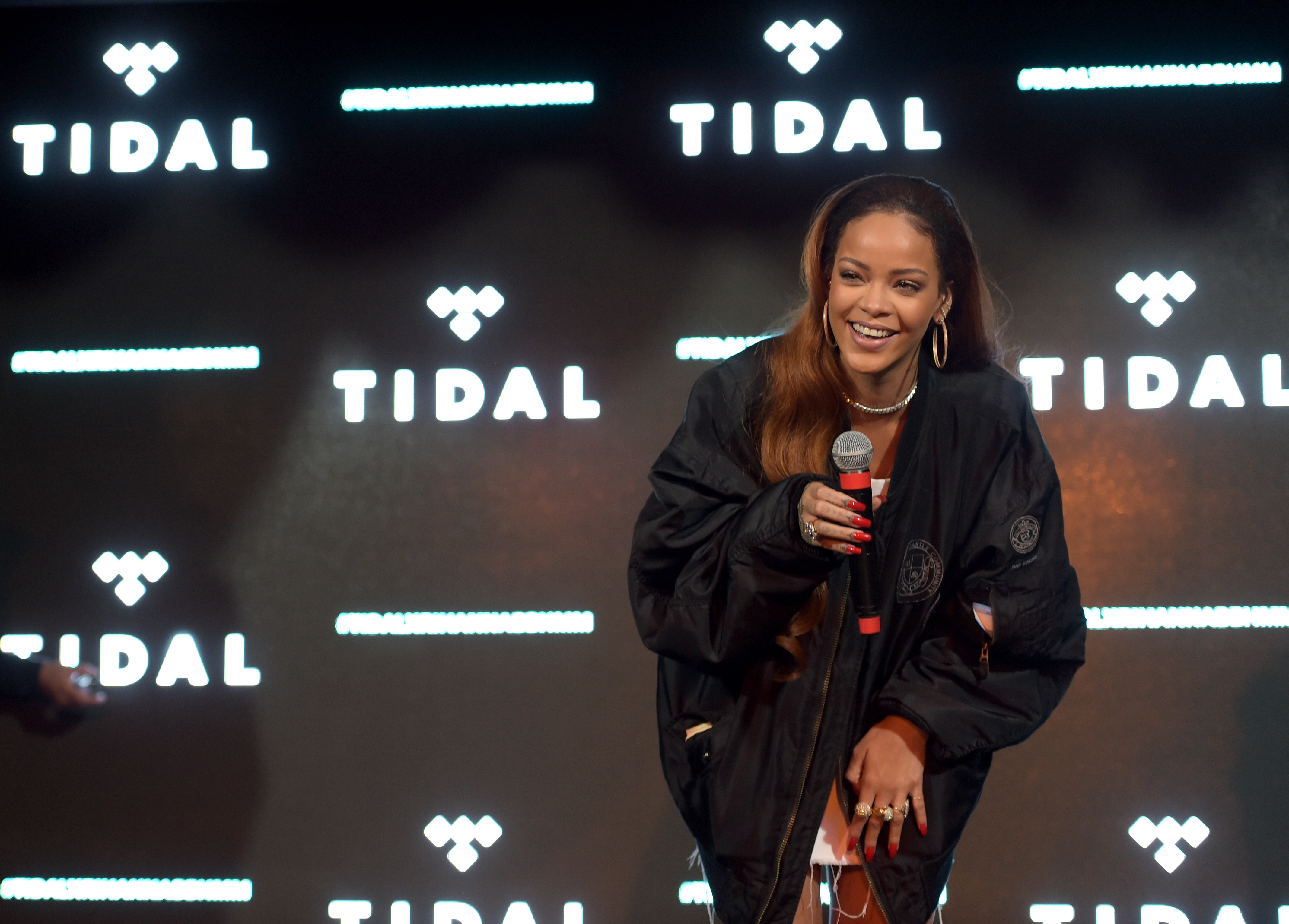 Rihanna Fights Reporter's Microphone After Chanel Show In Paris