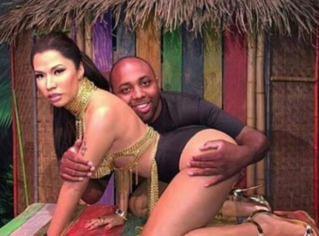 Man hugs Nicki Minaj waxwork