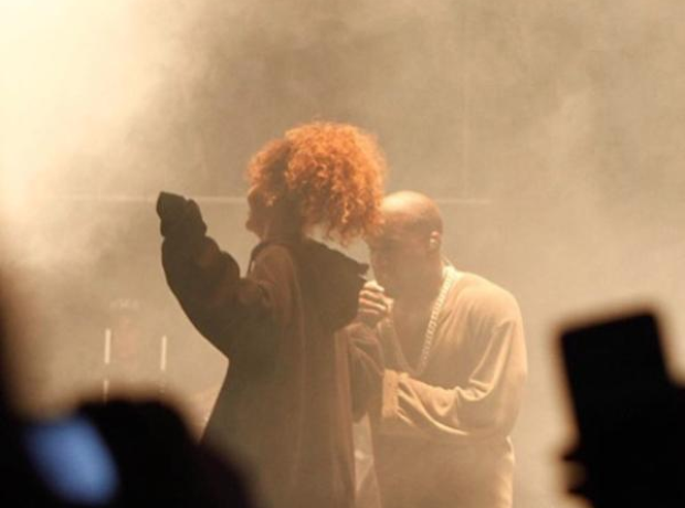 Rihanna and Kanye West perform on stage