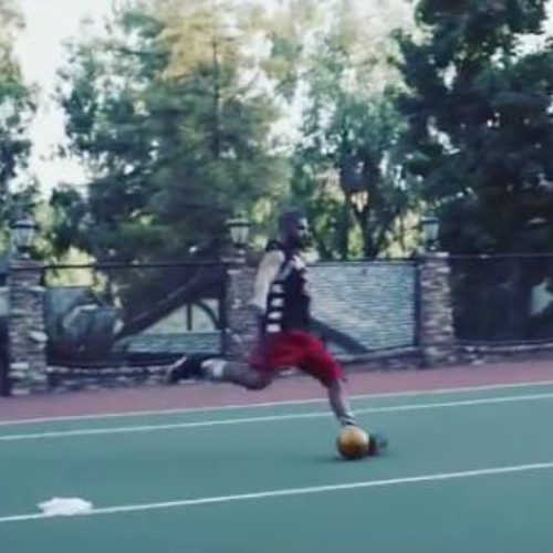 Drake kicking football