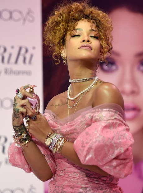 Rihanna testing her RiRi By Rihanna Perfume