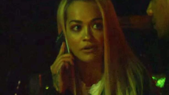 Rita Ora with phone in hand