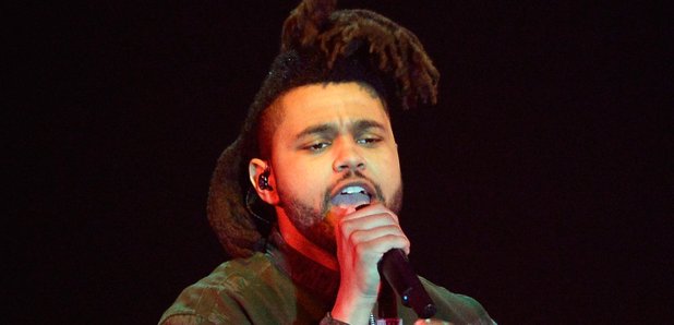 The Weeknd performs live on stage at the 2015 MTV 