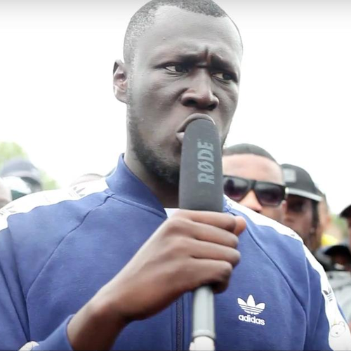 Stormzy rapping in front of crowd