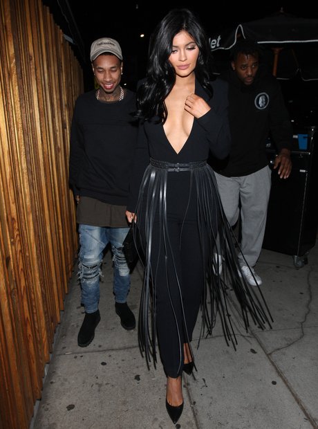 Kylie Jenner in low cut top with Tyga