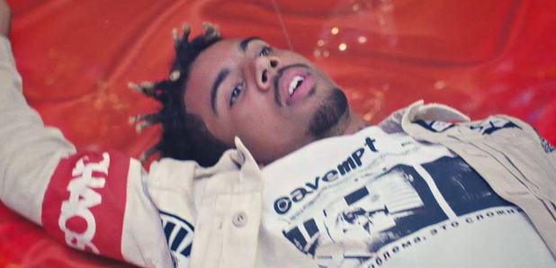 Vic Mensa laying on the floor