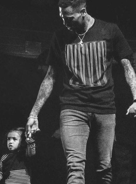 Chris Brown and daughter onstage