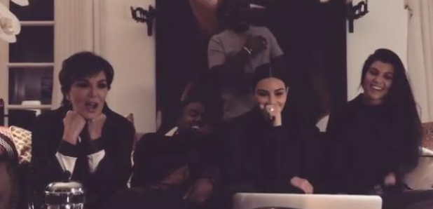Kanye West and Kardashians on sofa