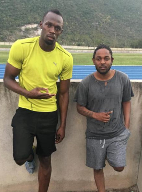 Kendrick Lamar and Usain Bolt at running track