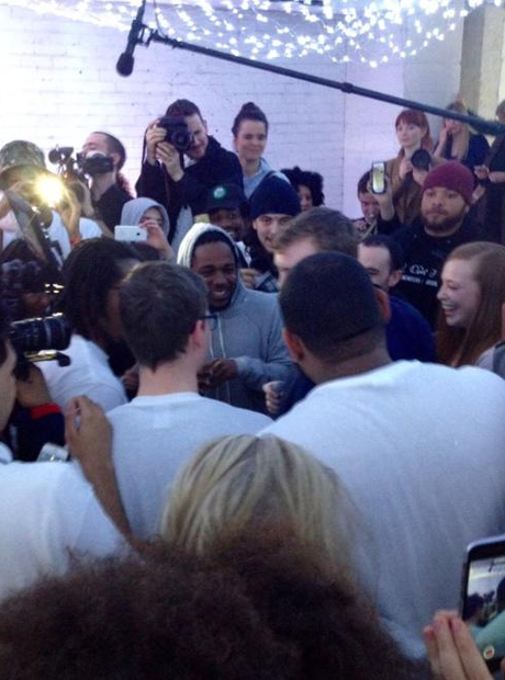 Kendrick Lamar in the middle of a crowd