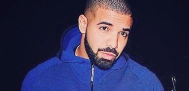 Drake wearing blue jacket